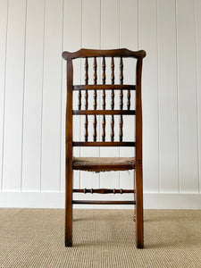 A Vintage Set of 6 English Oak Spindle Back Chairs with Rush Seats