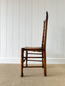A Vintage Set of 6 English Oak Spindle Back Chairs with Rush Seats