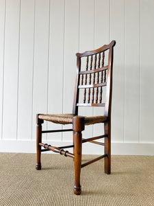 A Vintage Set of 6 English Oak Spindle Back Chairs with Rush Seats