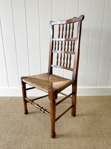 A Vintage Set of 6 English Oak Spindle Back Chairs with Rush Seats