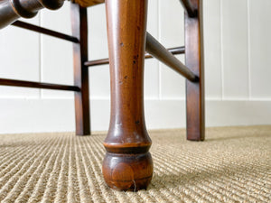 A Vintage Set of 6 English Oak Spindle Back Chairs with Rush Seats