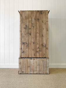 A Handsome English 19th Pine Cupboard with Dark Wooden Knobs