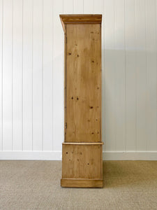 A Handsome English 19th Pine Cupboard with Dark Wooden Knobs