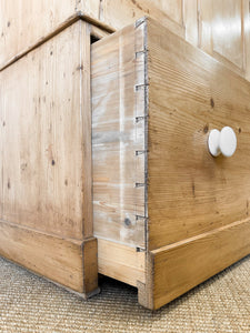 A Handsome English 19th Pine Cupboard with Dark Wooden Knobs