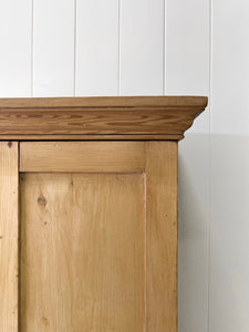 A Handsome English 19th Pine Cupboard with Dark Wooden Knobs