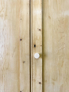 A Handsome English 19th Pine Cupboard with Dark Wooden Knobs