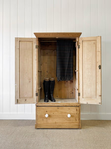 A Handsome English 19th Pine Cupboard with Dark Wooden Knobs