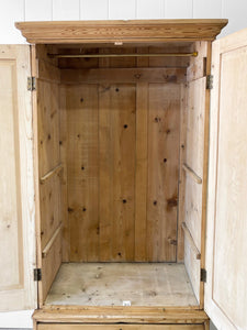 A Handsome English 19th Pine Cupboard with Dark Wooden Knobs