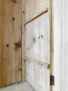 A Handsome English 19th Pine Cupboard with Dark Wooden Knobs