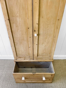 A Handsome English 19th Pine Cupboard with Dark Wooden Knobs