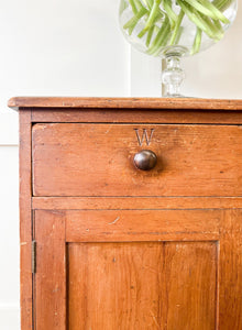 A Pleasant Narrow English Pine Cabinet or Sideboard with W and K Initials