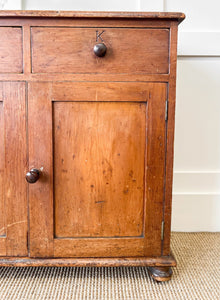 A Pleasant Narrow English Pine Cabinet or Sideboard with W and K Initials