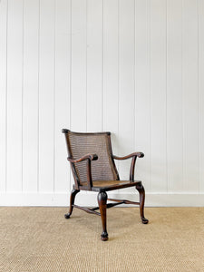 A 19th Century Mahogany Anglo-Indian Caned Arm Chair