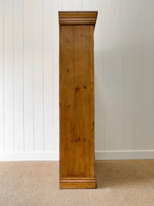 A Handsome English 19th Century Pine Cupboard with Wooden Knobs