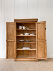 A Handsome English 19th Century Pine Cupboard with Wooden Knobs