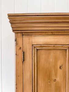 A Handsome English 19th Century Pine Cupboard with Wooden Knobs