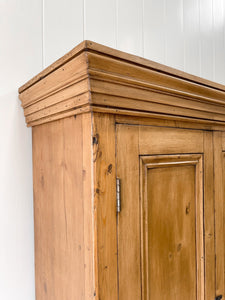 A Handsome English 19th Century Pine Cupboard with Wooden Knobs
