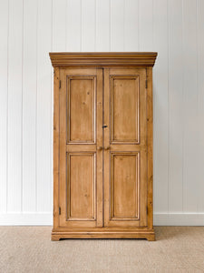 A Handsome English 19th Century Pine Cupboard with Wooden Knobs