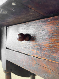 An Antique English Country Oak Drop Leaf Gate Leg Table