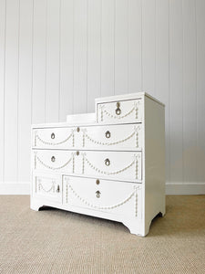 An Antique English Country House Chest of Drawers