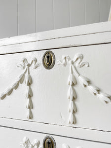 An Antique English Country House Chest of Drawers