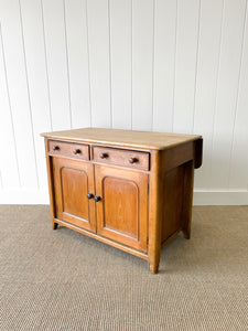 A Pleasant English Pine Cabinet or Sideboard with Drop Leaf