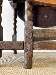 An Antique English Country Oak Drop Leaf Gate Leg Table