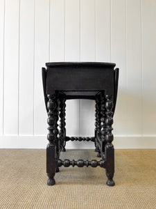 An Antique English Country Oak Drop Leaf Gate Leg Table