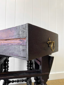 An Antique English Country Oak Drop Leaf Gate Leg Table