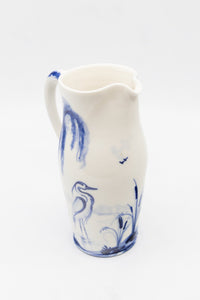 A Vintage English Blue and White Hand-painted Pitcher with Heron in Pond