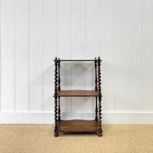 An English Victorian Mahogany "What-Not" Shelf