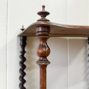 An English Victorian Mahogany "What-Not" Shelf