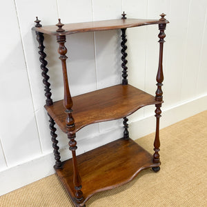 An English Victorian Mahogany "What-Not" Shelf