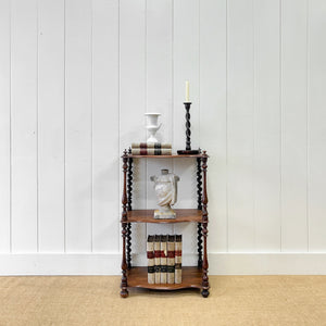 An English Victorian Mahogany "What-Not" Shelf