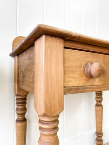 A Charming Pair of English Pine Bedside Tables