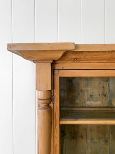 A 19th Century English Pine Bookcase Cabinet or Hutch with Glazed Doors