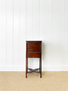 A George III Mahogany Sewing Table with Rising Lid