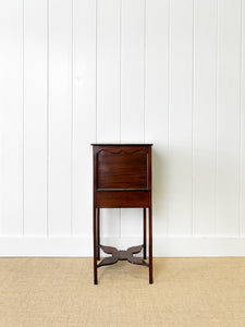 A George III Mahogany Sewing Table with Rising Lid