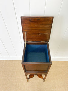 A George III Mahogany Sewing Table with Rising Lid