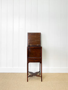A George III Mahogany Sewing Table with Rising Lid