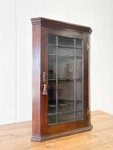 An Antique English George III Oak Wall Hanging Corner Cupboard