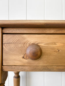 A Charming Pair of English Pine Bedside Tables