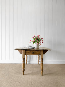 An English Country Pine Dining or Pembroke Drop Leaf Table