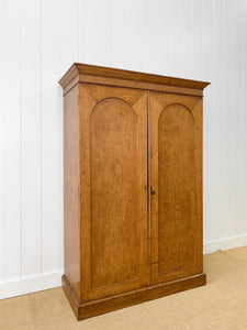 A Stately English 19th Century Oak Linen Press Cupboard