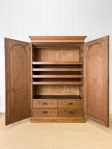 A Stately English 19th Century Oak Linen Press Cupboard