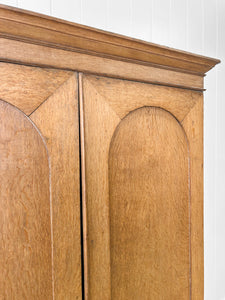 A Stately English 19th Century Oak Linen Press Cupboard