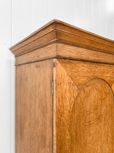 A Stately English 19th Century Oak Linen Press Cupboard