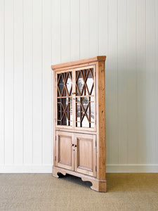 An English 19th Century Pine Corner Cupboard with Astragal Glazed Doors
