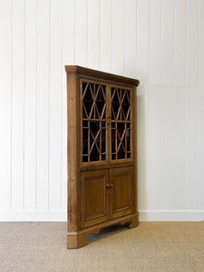 An English 19th Century Pine Corner Cupboard with Astragal Glazed Doors