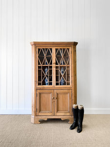 An English 19th Century Pine Corner Cupboard with Astragal Glazed Doors